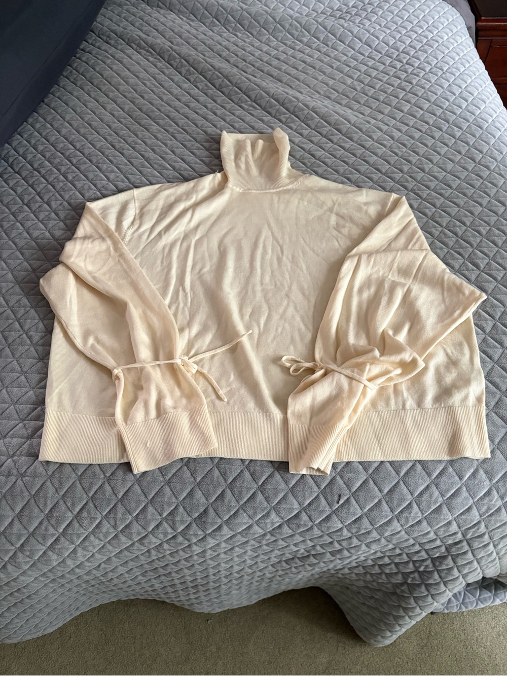 Uniqlo JW Anderson collab Cream Turtleneck Sweater with Tie-Sleeve Detail